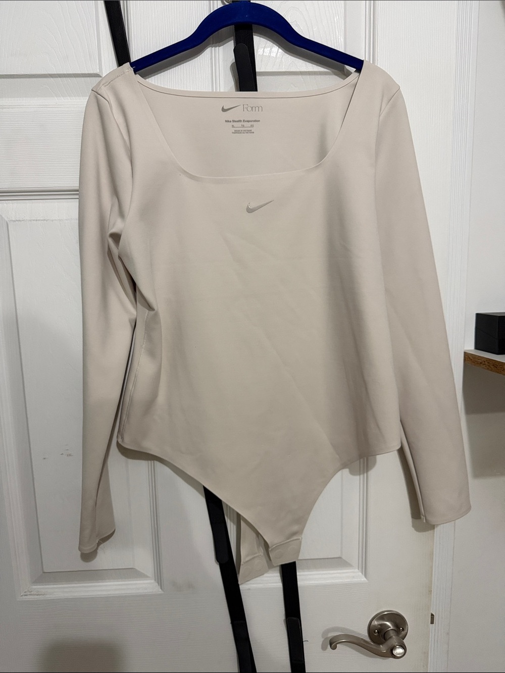 Nike Form Long-Sleeve Bodysuit in Cream